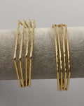 Pulseras doradas acero