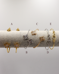 Pulseras doradas y plateadas acero