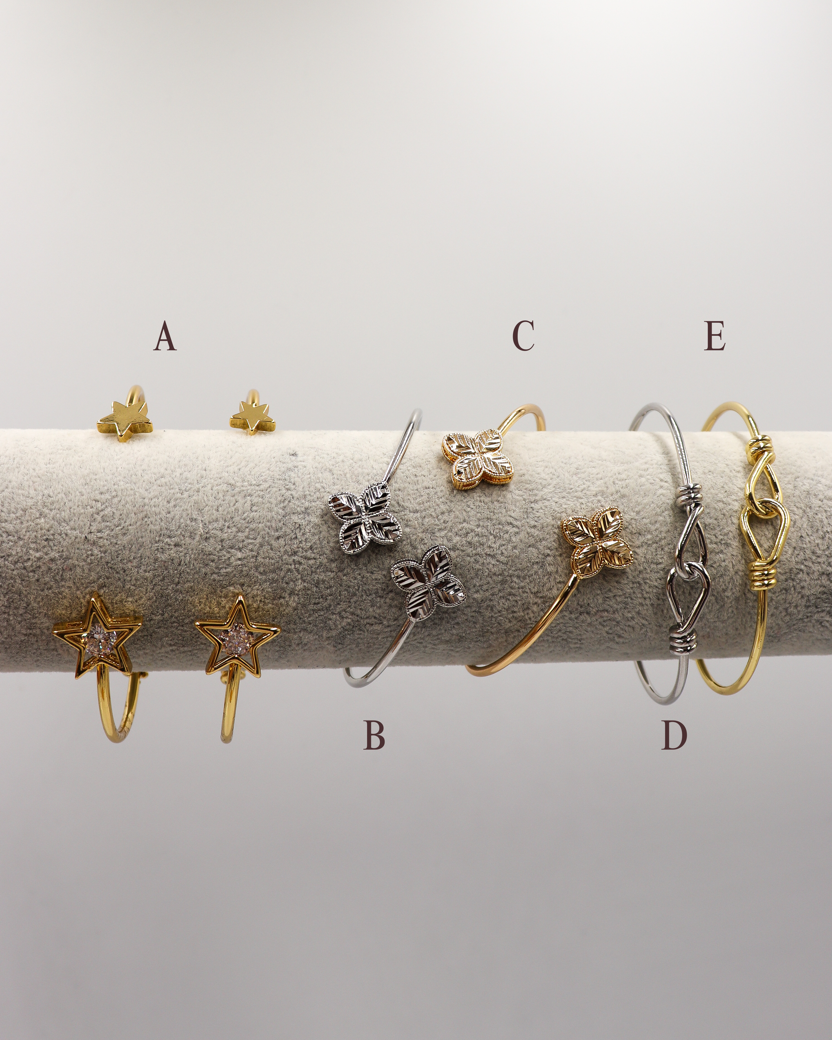Pulseras doradas y plateadas acero